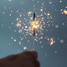 Sparkler against a sky background