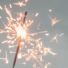 Sparkler against a sky background