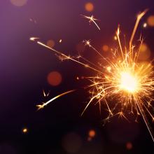 Sparkler on a purple background