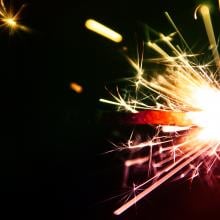 Colored sparks against a black background