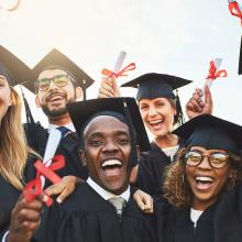 students in graduation caps and gowns