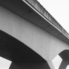 black and white photo of a bridge